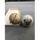 A FEATHERY TYPE SEWN SMALL BALL, AND A CRESTED BOURNMOUTH GOLF BALL ORNAMENT.