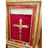 A GILT AND SILVERED METAL FRAMED CRUCIFIX