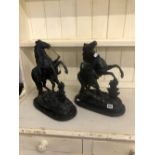 A PAIR OF SPELTER MARLEY HORSE FIGURES.