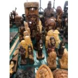 A GROUP OF VINTAGE AND LATER CARVED EUROPEAN AND RELIGIOUS FIGURES.