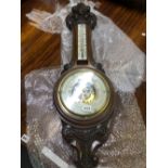 A LARGE VICTORIAN ANEROID BAROMETER.