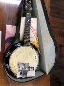 A VINTAGE BANJO, TOGETHER WITH A SIGNED GEORGE FORNBY PHOTOGRAPH.