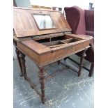 A 19th C. LINE INLAID WALNUT POUDREUSE TABLE, THE MIRROR LINED LID OPENING OVER DRAWERS,