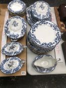 A BLUE AND WHITE ANTIQUE PART DINNER SERVICE.