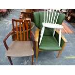 A 20th C. WING BACKED CHAIR, TWO OTHER CHAIRS, A LLOYD LOOM TYPE CHAIR AND AN OTTOMAN CONTAINING