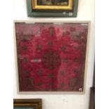 AN ANTIQUE EASTERN METAL THREAD AND RED SILK NEEDLEWORK PANEL 74 x 72cms