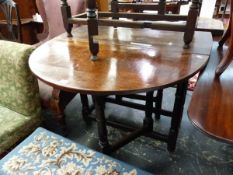 A 19th C. OAK OVAL DROP FLAP TABLE ON TURNED LEGS WITH SQUARE FEET. W 127 x D 89 x H 73cms.