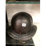 A ROUNDHEADS STYLE STEEL HELMET, TOGETHER WITH AN ANTIQUE EASTERN SHIELD.