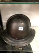 A ROUNDHEADS STYLE STEEL HELMET, TOGETHER WITH AN ANTIQUE EASTERN SHIELD.