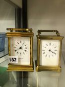 A TAYLOR AND BLIGH BRASS CASED CARRIAGE CLOCK, TOGETHER WITH AN UNSIGNED CARRIAGE CLOCK.