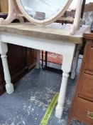 A PINE PLANK TOP TABLE ON WHITE PAINTED LEGS. W 79 x D 73 x H 73cms.