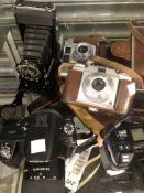 A LARGE COLLECTION SLR AND OTHER CAMERAS.