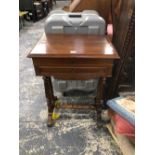 A 19th C. FRENCH MAHOGANY POUDREUSE WORK TABLE, THE MIRROR LINED LID OVER COMPARTMENTS ABOVE A