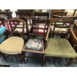 A REGENCY MAHOGANY ELBOW CHAIR WITH TWO LATER MAHOGANY SIDE CHAIRS