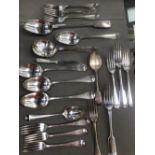 A QUANTITY OF SILVER PLATE CUTLERY INCLUDING A LARGE SERVING SPOON.