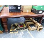 A VICTORIAN MAHOGANY WIND OUT DINING TABLE, THE ROUNDED RECTANGULAR TOP WITH TWO LEAVES. W 184 x D