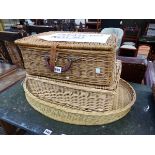 A CORACLE FITTED PICNIC BASKET, ANOTHER BASKET TOGETHER WITH A BASKET WORK OVAL TRAY