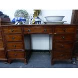 A 20th C. MAHOGANY PEDESTAL DESK, THE KNEEHOLE DRAWER FLANKED BY BANKS OF FOUR DRAWERS ON BRACKET