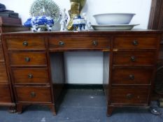 A 20th C. MAHOGANY PEDESTAL DESK, THE KNEEHOLE DRAWER FLANKED BY BANKS OF FOUR DRAWERS ON BRACKET