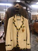 A VINTAGE BODGER AND CO BLAZER, TOGETHER WITH A VINTAGE FUR SHEEPSKIN COAT.