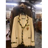 A VINTAGE BODGER AND CO BLAZER, TOGETHER WITH A VINTAGE FUR SHEEPSKIN COAT.