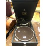 A HMV MODEL 101 PORTABLE GRAMOPHONE.