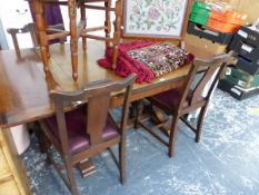 AN OAK DRAW LEAF TABLE. W 167 x D 91 x H 76cms. TOGETHER WITH FOUR CHAIRS