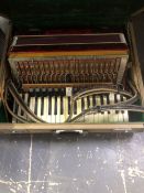 A PIANO ACCORDIAN.