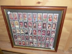 A FRAMED COLLECTION OF KINGS AND QUEENS OF ENGLAND CIGARETTE CARDS TOGETHER WITH TWO LANDSCAPE