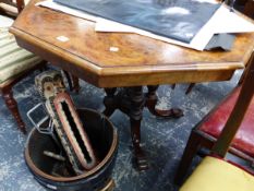 A VICTORIAN BURR WALNUT OCTAGONAL TABLE SUPPORTED ON FOUR COLUMNS AND SWEPT LEGS WITH WHITE