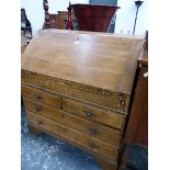 A 19th C. OAK BUREAU, THE FALL ABOVE TWO SHORT AND TWO LONG DRAWERS ON BRACKET FEET. W 92 x D 49 x H