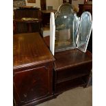 A FILE CABINET, A TRIPTYCH MIRROR, AND A DRUM TABLE.