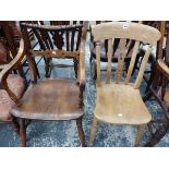 AN UNUSUAL OXFORD TYPE YEW ELBOW CHAIR WITH CURVED ROPE CENTRED TOP RAIL TOGETHER WITH A SADDLE SEAT