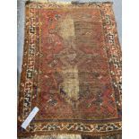 A PERSIAN SHIRAZ RUG. 166 x 115cms. TOGETHER WITH A TRIBAL PRAYER RUG. 1120 x 77cms (2)