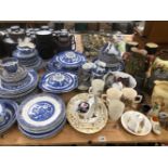 A QUANTITY OF BLUE AND WHITE DINNER WARES, A MAJOLICA JUG, A PAIR OF CHARACTER JUGS ETC.