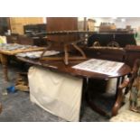 A 20th C. MAHOGANY DINING TABLE WITH SINGLE LEAF, THE D-ENDS ON FOLIATE CARVED COLUMNS AND REEDED