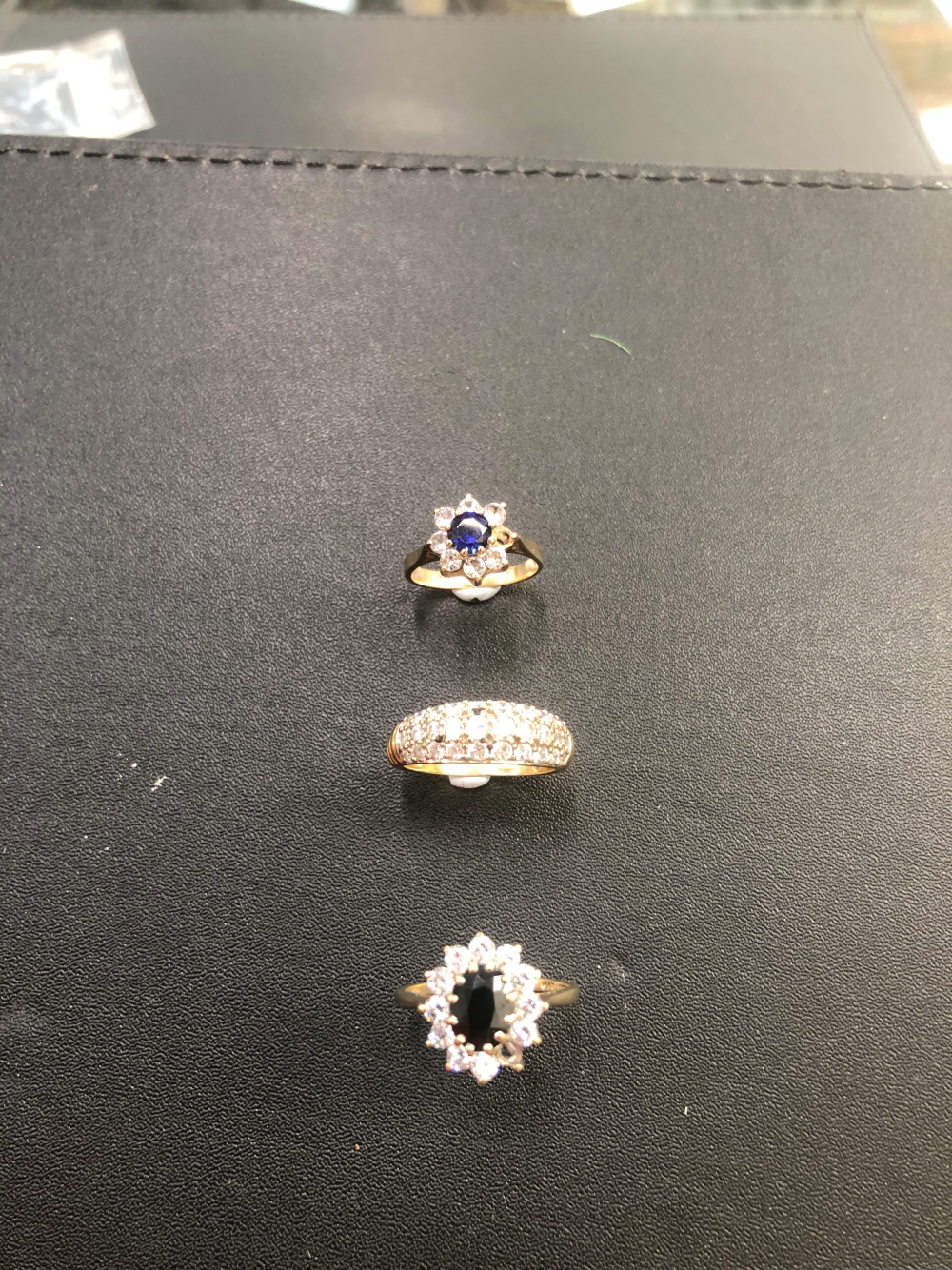 THREE 9ct HALLMARKED GOLD DRESS RINGS.