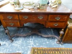 A 19th C. CROSS BANDED MAHOGANY SIDE TABLE, THE RECTANGULAR TOP ABOVE FIVE DRAWERS, THE TURNED