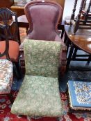 A VICTORIAN MAHOGANY SHOW FRAME ARMCHAIR TOGETHER WITH A NURSING CHAIR, THE RECTANGULAR BACK AND