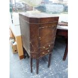 A GEORGE III MAHOGANY BEDSIDE CUPBOARD, THE LID OPENING ONTO WASH BOWL AND JUG RECEIVERS ABOVE TWO