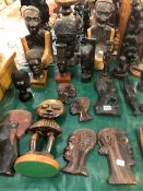 VARIOUS CARVED HARDWOOD AFRICAN MASKS ETC