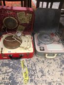 THREE RETRO RECORD PLAYERS IN CARRY CASES AND A RECORD CASE.