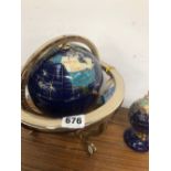 TWO HARDSTONE INSET DECORATIVE GLOBES.