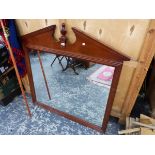 A 20th C. RECTANGULAR MIRROR IN A MAHOGANY FRAME WITH THE BROKEN PEDIMENT CENTRED BY A BALUSTER