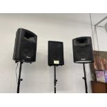 A PAIR OF PRO SOUND NO8CQ SPEAKERS ON ADJUSTABLE STANDS AND ONE OTHER.