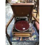 A COLUMBIA PORTABLE GRAMOPHONE IN A BROWN CASE, CIRCA 1925.