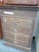 AN OAK WASHSTAND, THE CENTRALLY SPLIT LID ENCLOSING A COMPARTMENT ABOVE FOUR DRAWERS. W 58 x D 47