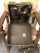 A VICTOR SILENT 16mm FILM PROJECTOR WITH POWER SUPPLY TRANSFORMER.