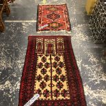 A BELOUCH TRIBAL PRAYER RUG. 118 x 76cms, AN ORIENTAL SMALL RUG. 89 x 62cms AND TWO MACHINE MADE