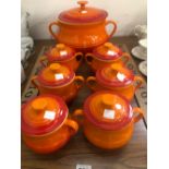 A SET OF LE CREUSET SOUP TUREEN AND SIX SMALL LIDDED SOUP BOWLS.